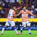 Jugadores de Correcaminos UAT durante el partido ante Leones Negros en el Estadio Jalisco